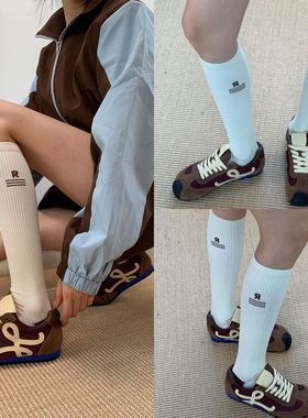 “你的骑行生活美学”2025秋冬通勤骑行穿搭Yiss白色字母小腿袜DF