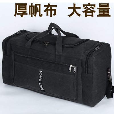 超大容量手提旅行包厚帆布旅游行李袋打工民工包装衣服背包多隔层