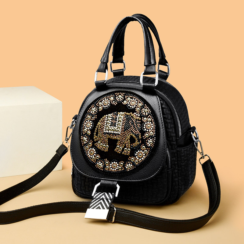 双肩包女2025新款时尚百搭真皮象纹单肩手提多功能层通勤女士背包