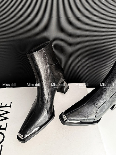 Black ankle boots with square toe and low heel