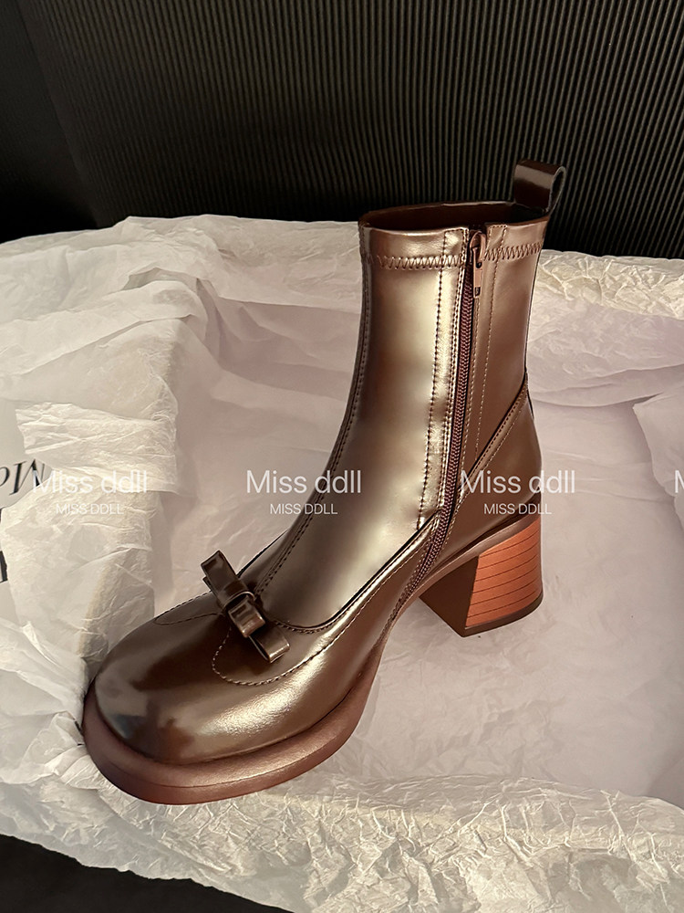 Metallic brown ankle boot with side zipper and bow detail