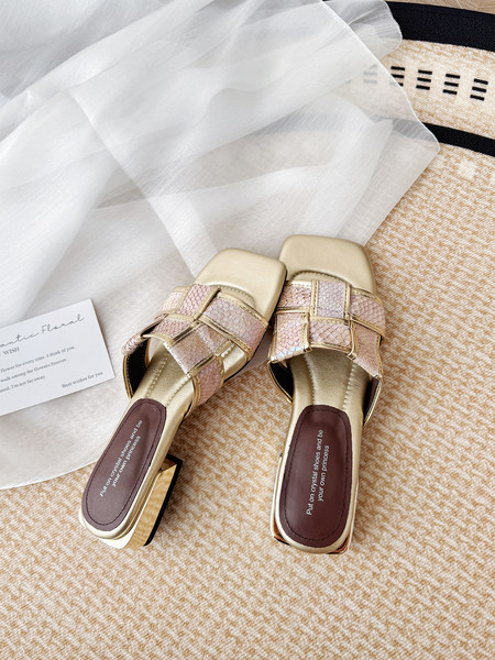 Pair of gold and pink embellished heeled slide sandals