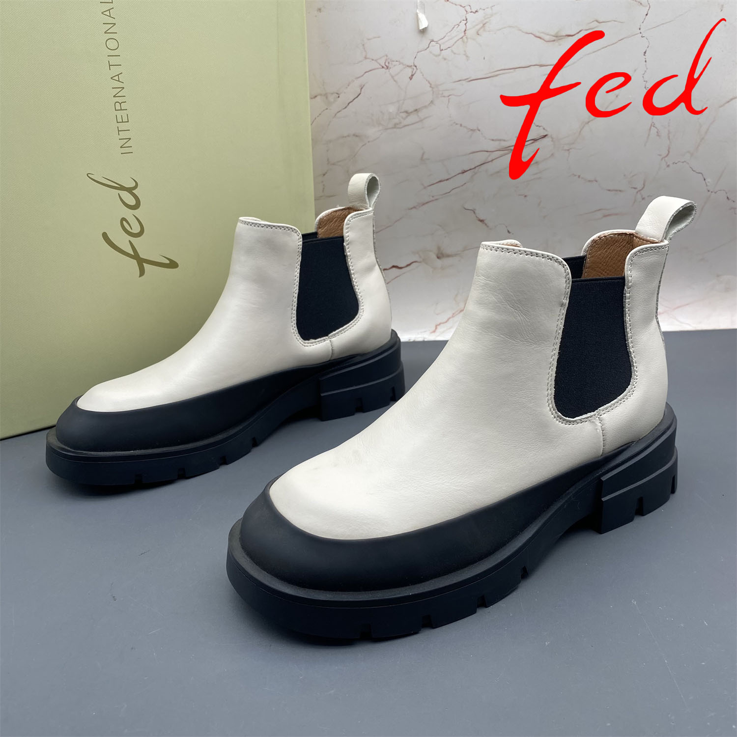 38码fed/艾芙伊迪撤柜断码牛皮女鞋套筒弹力圆头平底防滑时尚短靴