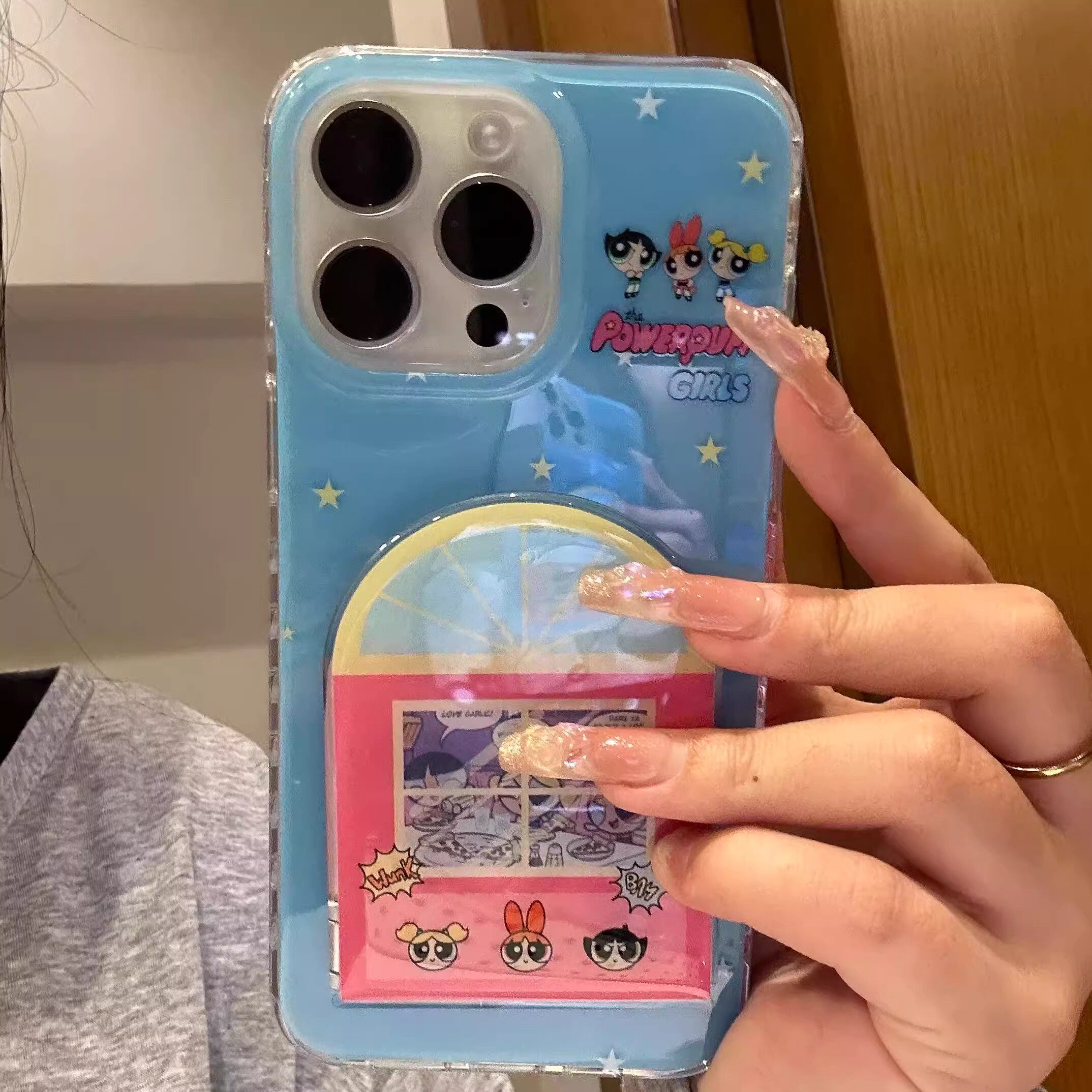 蓝底飞天小女警镜子适用苹果17promax手机壳支架16/15卡通14女13简约11pro防摔X/XR趣味7/8plus情侣6plus大孔