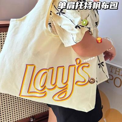 YL众印花字母logo帆布包