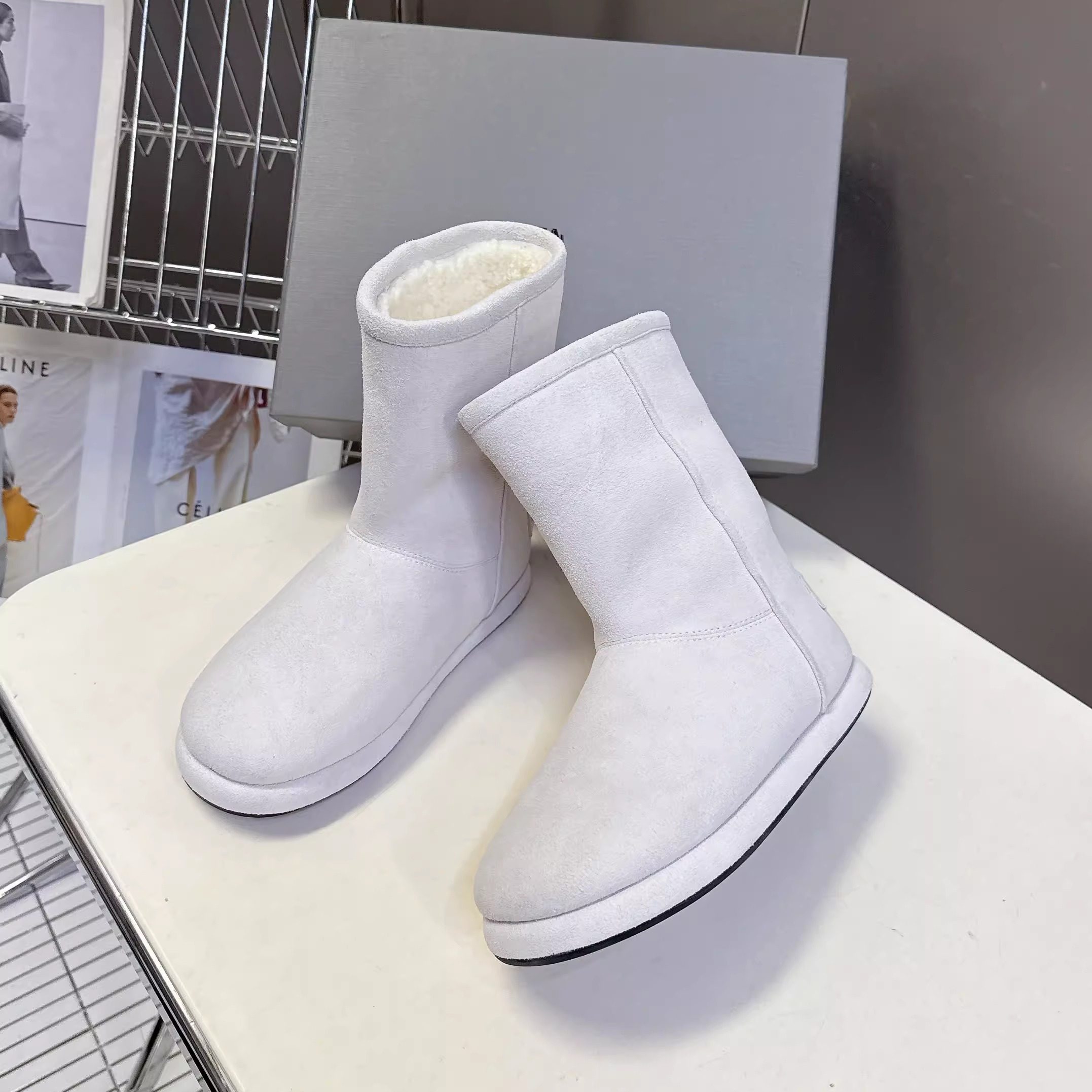 欧洲站女靴东北雪地靴女皮毛一体2026冬季新款加厚羊毛保暖短筒靴