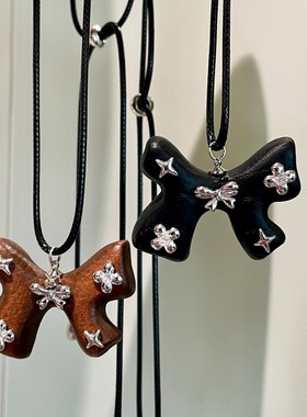 小众设计感黑绳长款木头毛衣链ins极简风木质蝴蝶结多元素项链女