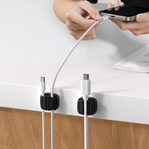 Cable organizer for desktop phone charging cables,