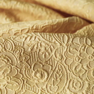 法国进口淡黄色立体浮雕提花真丝醋酸混纺时装布料设计师礼服面料