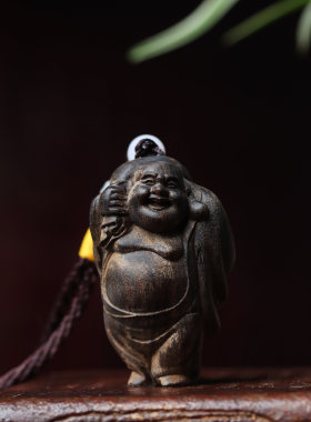 沉香木布袋佛手把玩件