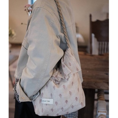 杏粉花边hobo水桶女生单肩斜挎包