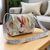 民族风枕头包包女士2025新款 宽带斜挎包双面水桶包复古单肩圆筒包