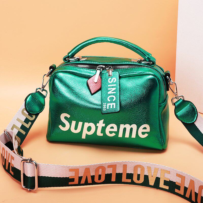 软皮包包欧洲站小众设计女包2022新款宽肩带斜挎包亮皮百搭枕头包