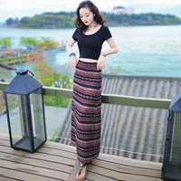 Phong cách dân tộc nửa váy dài mùa hè nữ eo cao Yi quốc tịch túi đi biển che hông Váy che khuyết điểm Một đoạn dài đến mắt cá chân - Váy chân váy đuôi cá ngắn