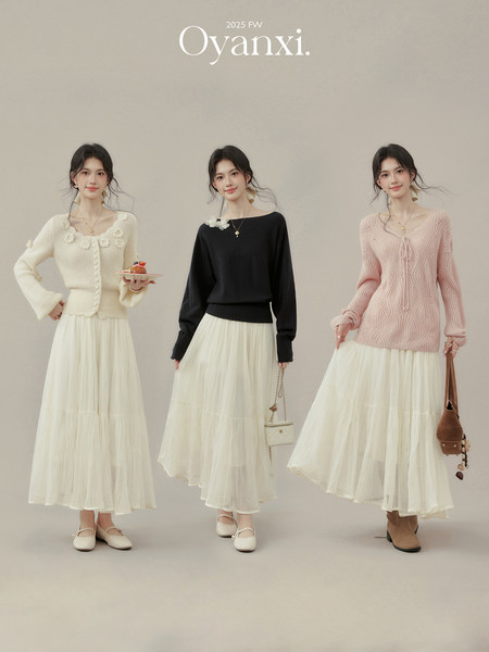 Fashion lookbook showing three women wearing knit sweaters and flowing skirts