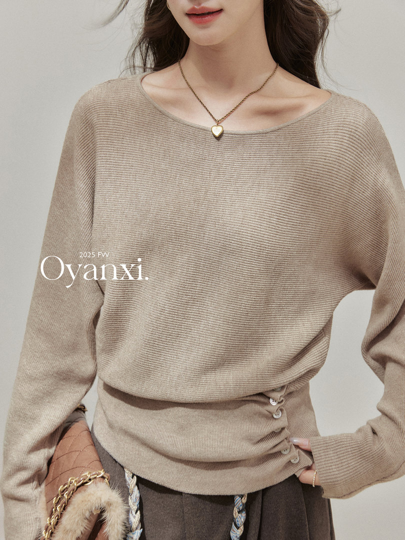 Beige ribbed knit long-sleeve sweater worn by a model