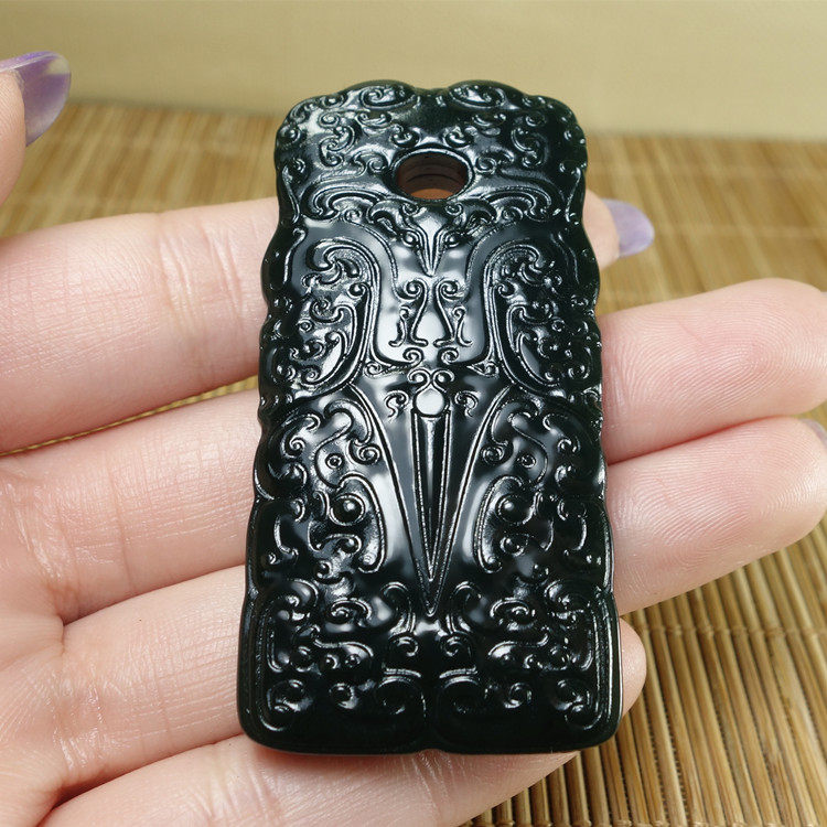 新疆和田墨玉兽面剑兽面纹镂空仿古
