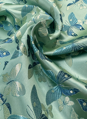 浅蓝绿底湖蓝色缎面飞舞小蝴蝶秀气花枝织锦缎布料古香丝绸面料