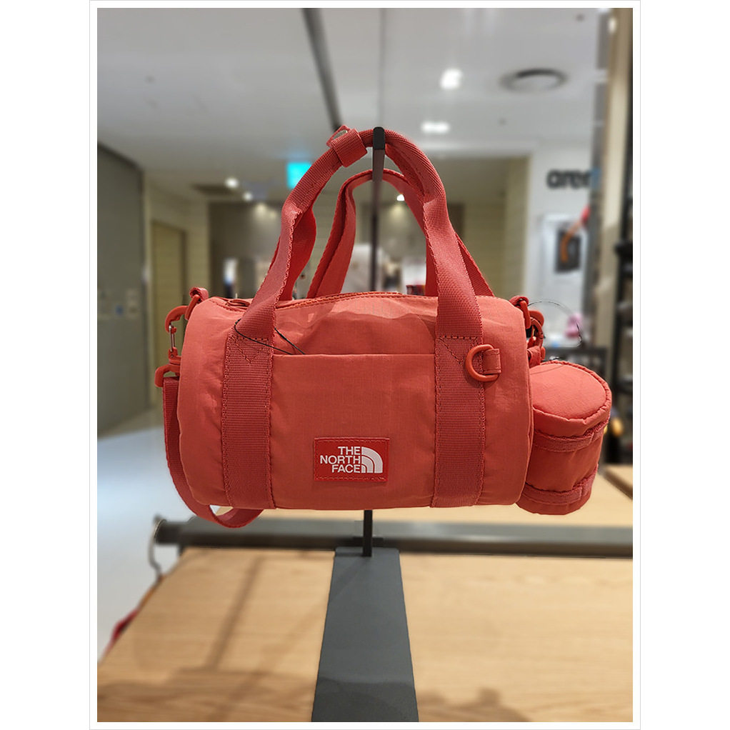 26新韩国直邮TheNorthFace北面时尚手提斜挎包休闲圆筒包NN2PS37