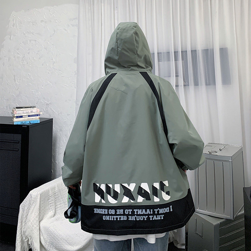 Hong Kong style models wear trendy oversized print Hooded Jacket