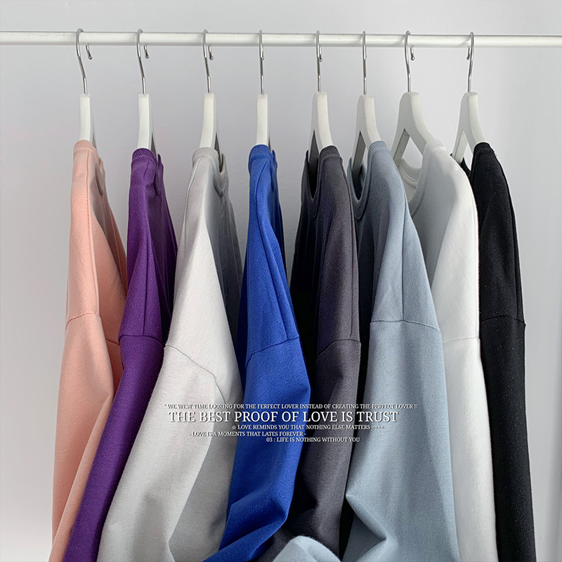 Polychrome printed crew neck sweater with port style flat bottom