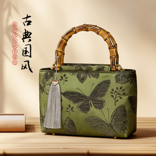 新中式绿光碟语绣花手提包古风旗袍宴会金属手提面料小方包