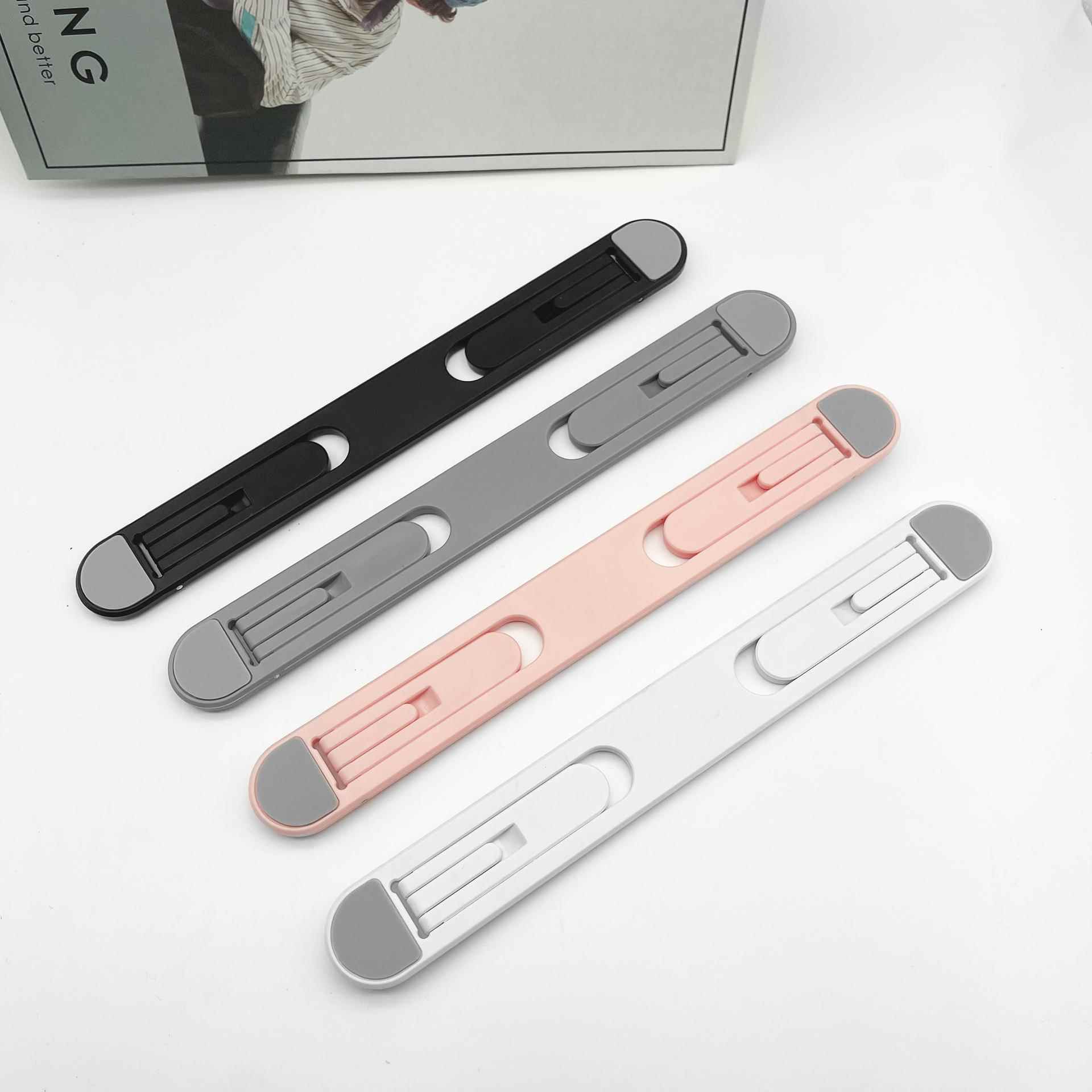 跨境桌面折叠隐形塑料散热便捷垫高两档可调节笔记本电脑平板支架