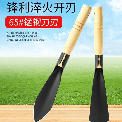 A small gardening spade for planting flowers and digging wil