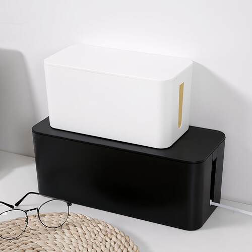Cable management box for power strips and sockets, a desktop