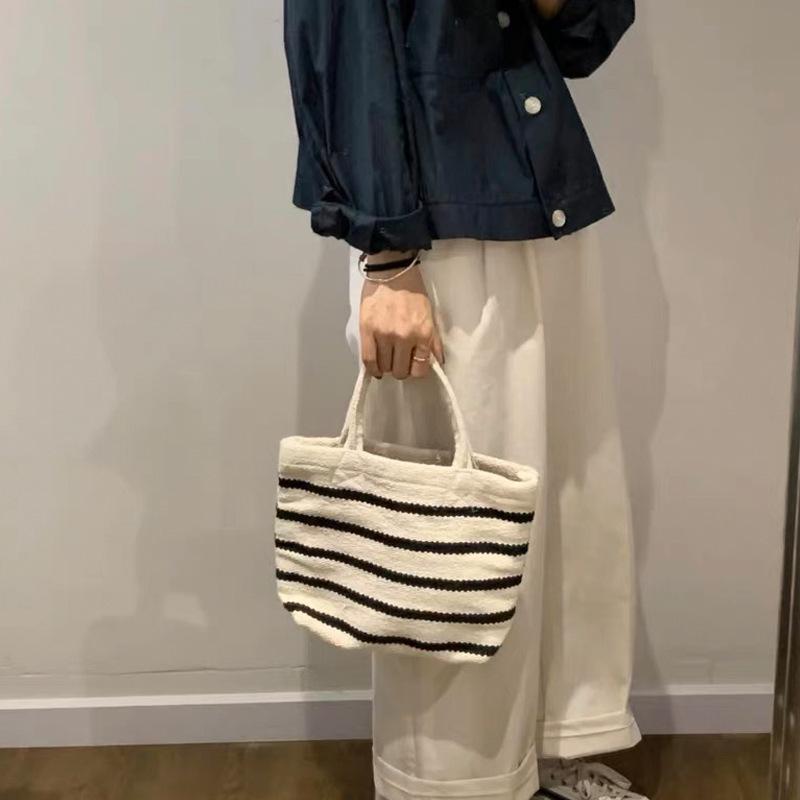 手提包斜挎包新品条纹通用款女包