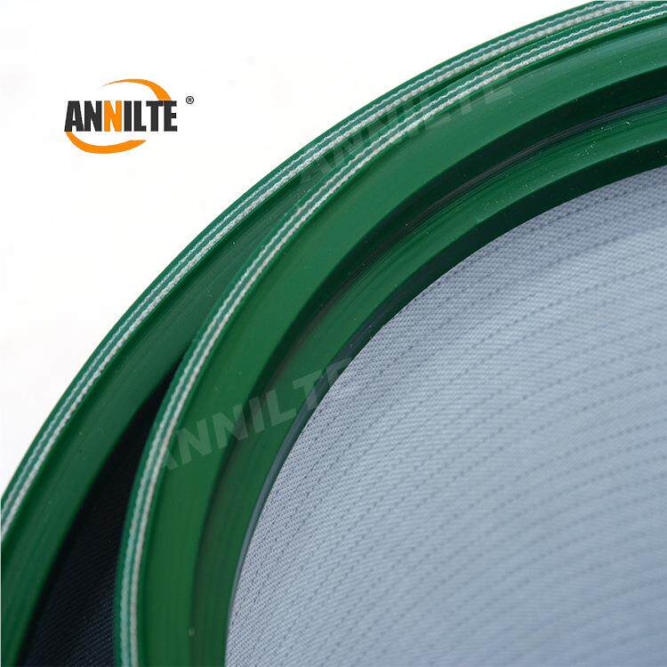 导山东安耐PCV绿色输带加导条防跑送偏传送带轨皮带