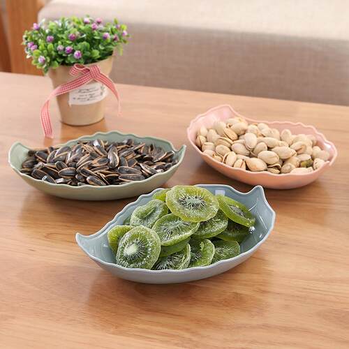Colorful leaf-shaped fruit and candy dish, stylish in candy