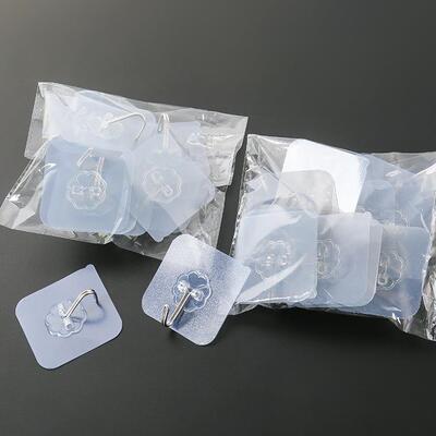 Pack of 10 transparent, traceless adhesive hooks. No nails o
