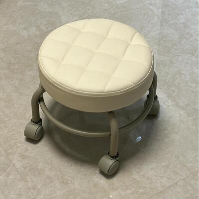 A versatile swivel stool with wheels, designed for comfortab