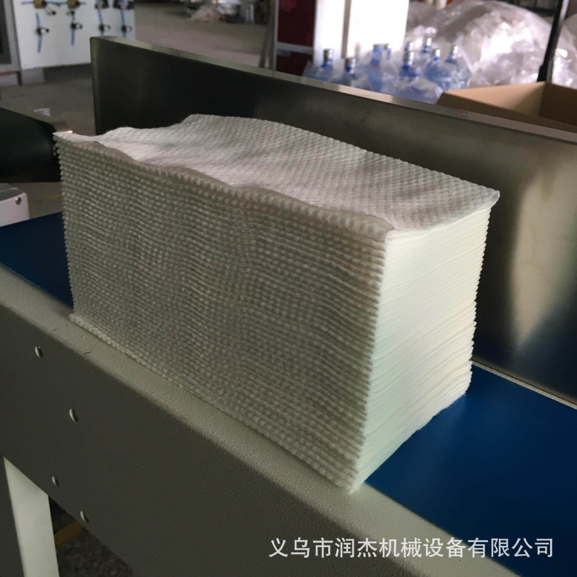 供应一次性无纺布折叠设备点虚线抽拉机干湿两用款机器生产厂家