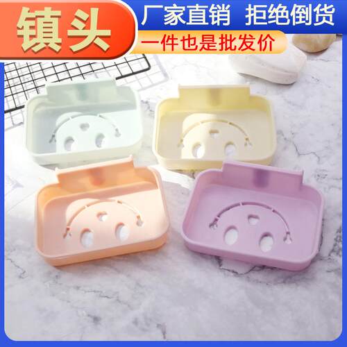Wall-mounted soap holder for the bathroom, designed to be ad