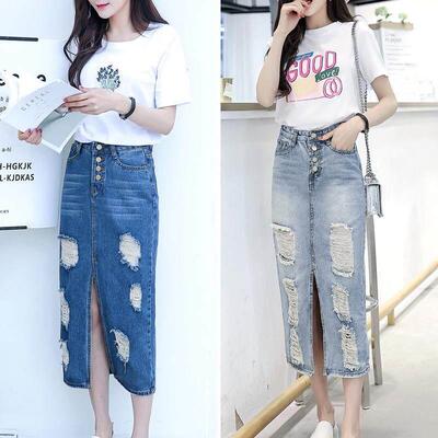 Denim skirt with long and torn holes, over the knee and butt