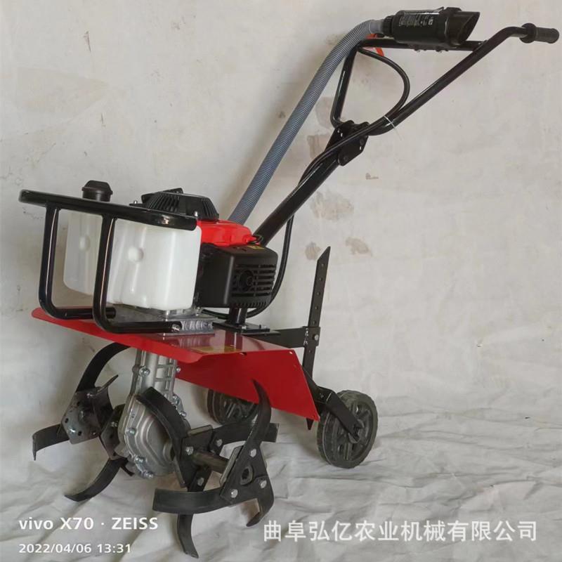 老人妇女手推汽旋机农用小TZV型油耕地机菜园种松植土打草耕开沟