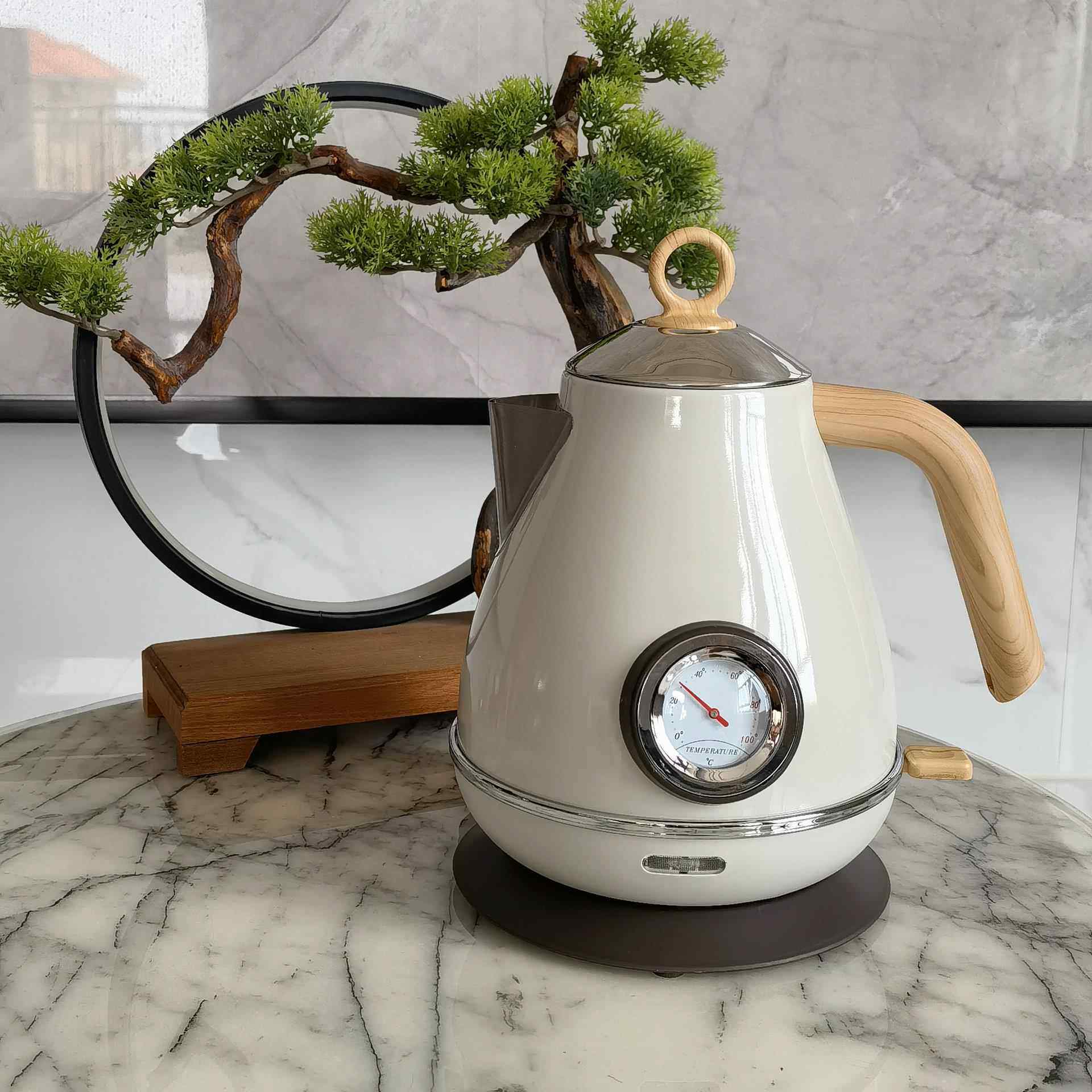 复古烤漆木纹带温度显示电热水壶 实用新型专利ZL201520270207.