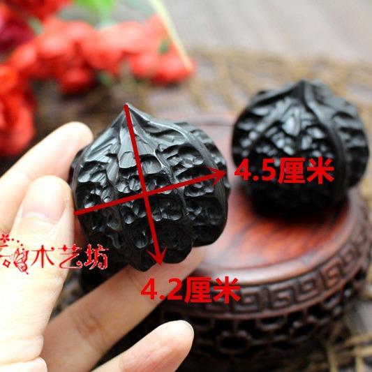 檀木紫光檀乌木核桃手把件木雕手捻三棱文玩核桃黑檀工艺古雅