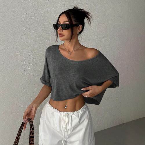 Women's cropped short sleeved shirt with exposed