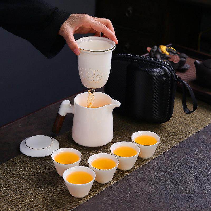 可携式旅行茶具白瓷套装户外泡茶喝茶装备全瓷孔过滤快客一壶四杯