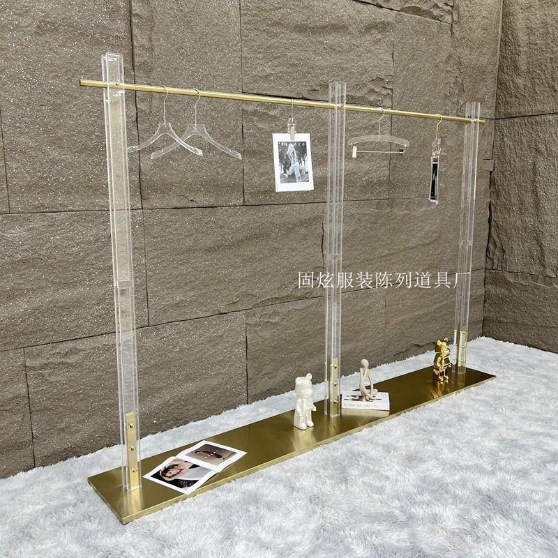服装店展示架轻奢不锈钢压克力落地式中岛架钛合金陈列架挂衣架定