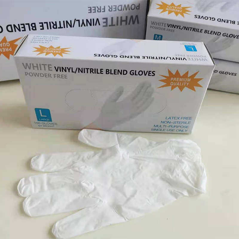 供应万力一次性手套食品级丁腈pvc白色出口批发美容园艺防护