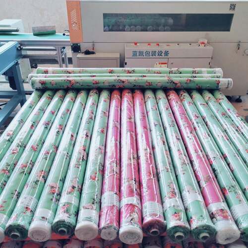 绍兴柯桥安昌袍江钱清全自动布匹包装机布卷面料自动热收缩包装机