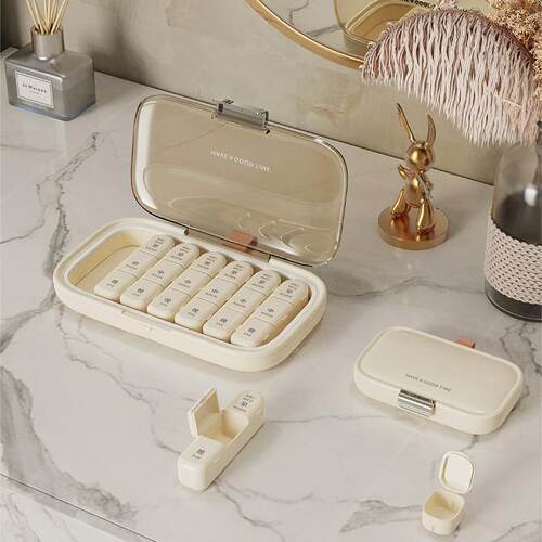 Portable pill organizer with a lid, moisture-proof and compa