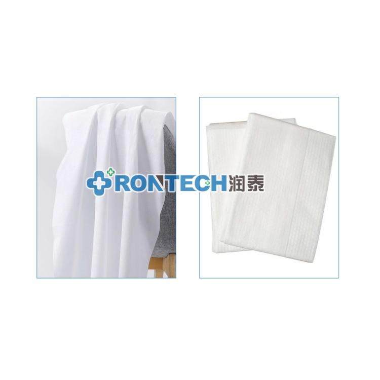 润泰全自动一次性毛巾浴巾机折叠机，床单机旅行四件套生产厂家