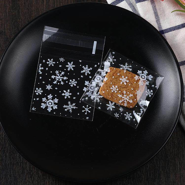 厂家直销烘培曲奇饼干自封袋西点袋白色雪花透明糖果袋香皂自粘袋