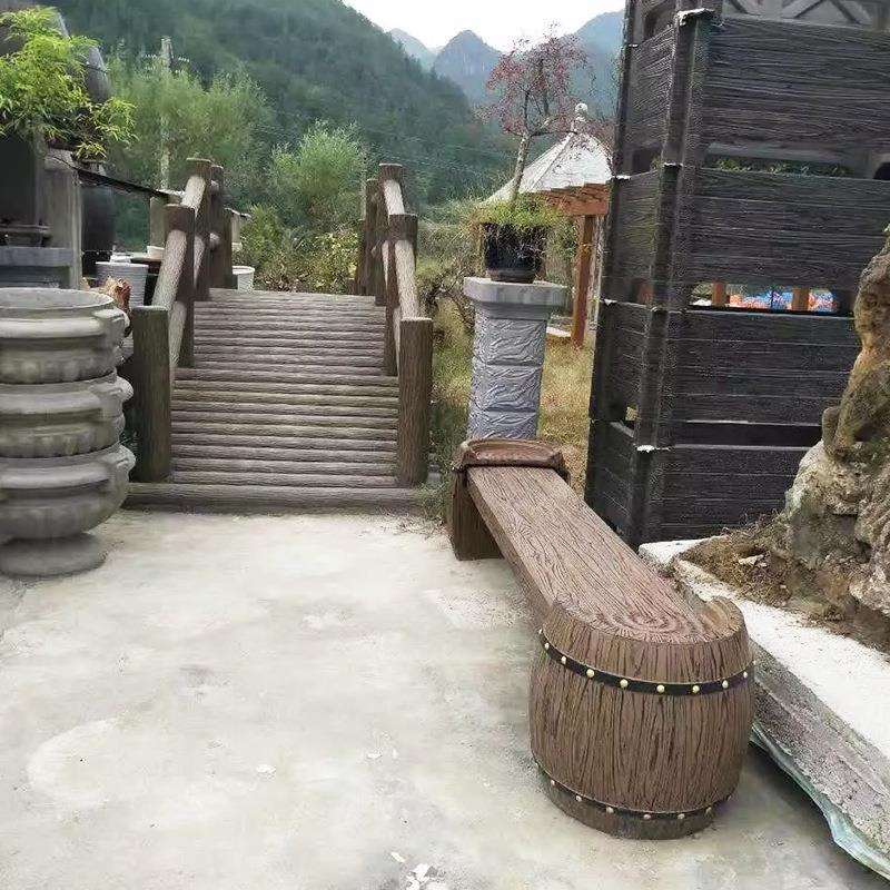 水泥仿木长凳公园景区休息凳子仿树桩喷漆半圆筒仿木坐凳厂家直销