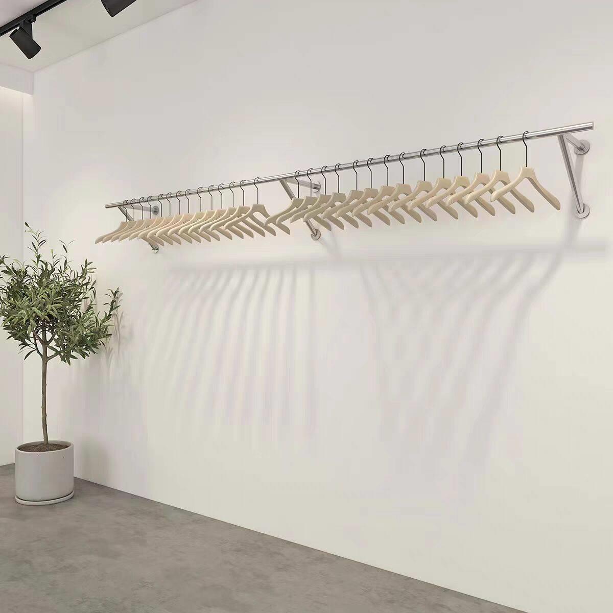 服装店展示架上墙壁挂式加厚不锈钢简约女装店货架童装挂衣架定制